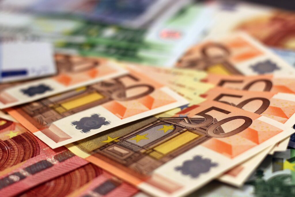 pexels-photo-259249-259249 Stack of 50 euro banknotes, representing wealth and finance concepts.