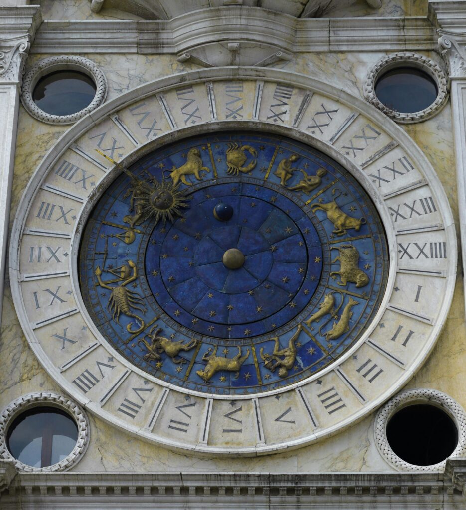 Detailed view of the Zodiac Clock at St Mark's Clocktower in Venice, showcasing astrological signs.